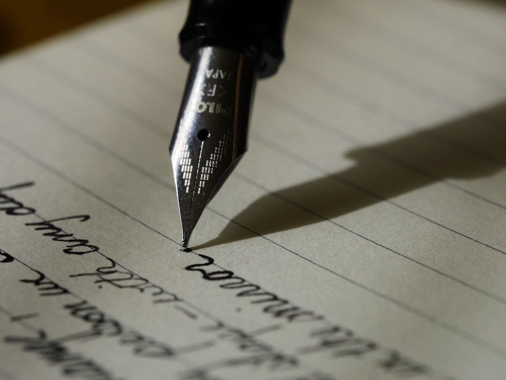 A fountain pen writing by hand